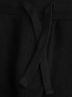 Coccodrillo Spodnie dresowe WC5120103MBK Czarny Slim Fit