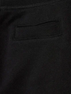 Guess Spodnie dresowe L2YQ46 KAIJ1 Czarny Regular Fit